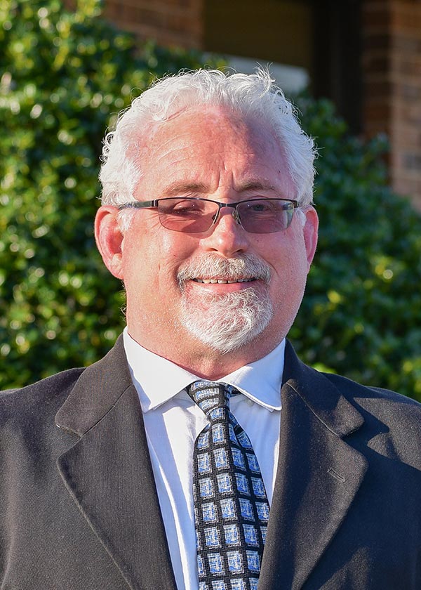 Headshot of office supply delivery driver Jim Brooks