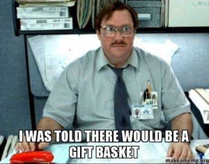 Office worker with text "I was told there would be a gift basket"